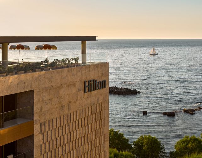 Hilton, Christopher Nassetta, Hilton Rise, Hilton Honors, Hotelkosten, Hotelrentabilität, KI, Navan, RevPAR, EBITDA, Hotellerie, Hotel Dive